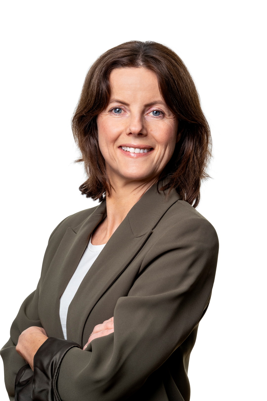 En smilende kvinne i dressjakke. Protrettfoto